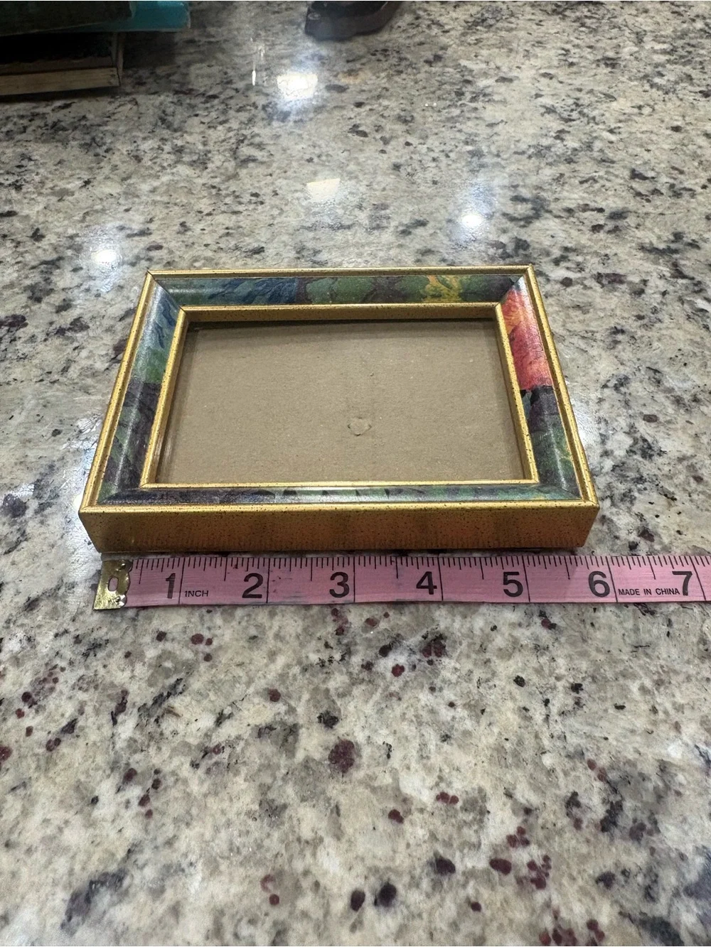 Gold picture frame with fun print trim GUC 5 x 7